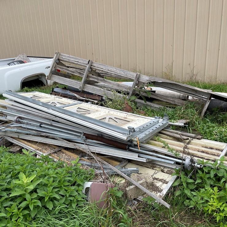 #7126 • Pile of Used Garage Doors, Sheet Metal and More