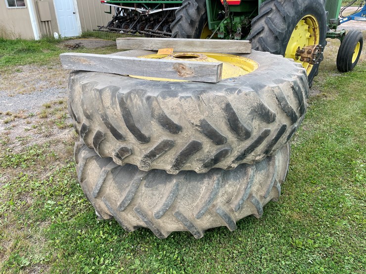 #7118-•-set-of-18.4-r38-bolt-on-dual-tractor-tires-image-1