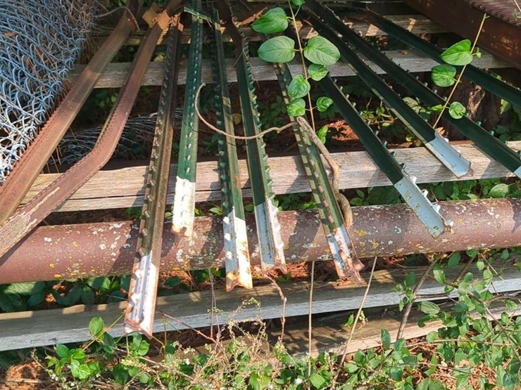 17'-x-6'-x-5'-outdoor-pipe-storage-rack-with-3-shelves,-with-assorted-lumber,-stakes,-and-large-26'-x-6"-pipe-(blue-metal-horses-not-included)-image-5