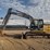 2010-deere-120d-image-1