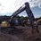 2010-deere-120d-image-49