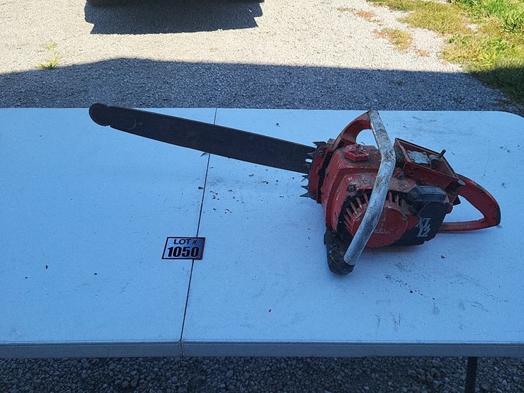 homelite-xl12-gas-chain-saw---not-complete-tag-#1050-image-1