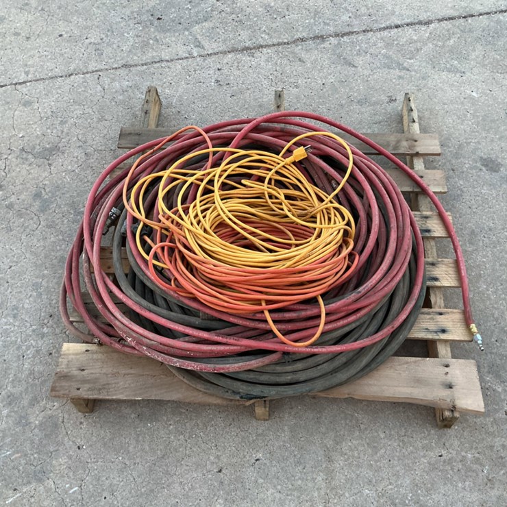 PALLET OF EXTENSION CORDS AND AIR HOSES