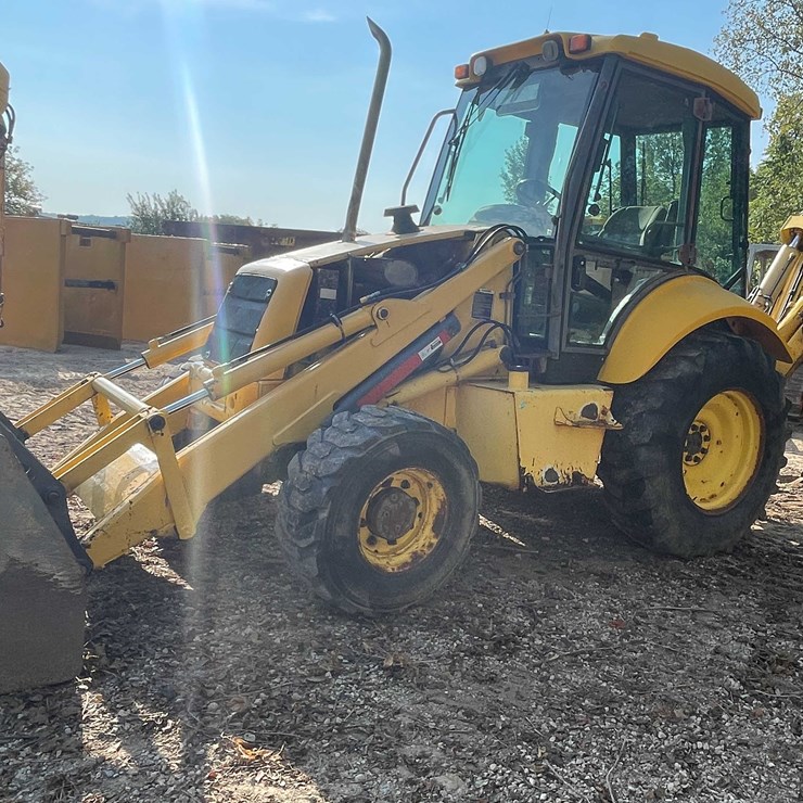 #13311 • 2001 New Holland LB110E Backhoe Loader