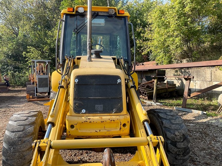 #13311-•-2001-new-holland-lb110e-backhoe-loader-image-13