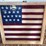 lighting-rods-and-american-flag-painted-on-old-window-image-5