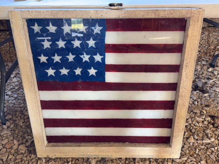 lighting-rods-and-american-flag-painted-on-old-window-image-5
