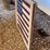lighting-rods-and-american-flag-painted-on-old-window-image-6