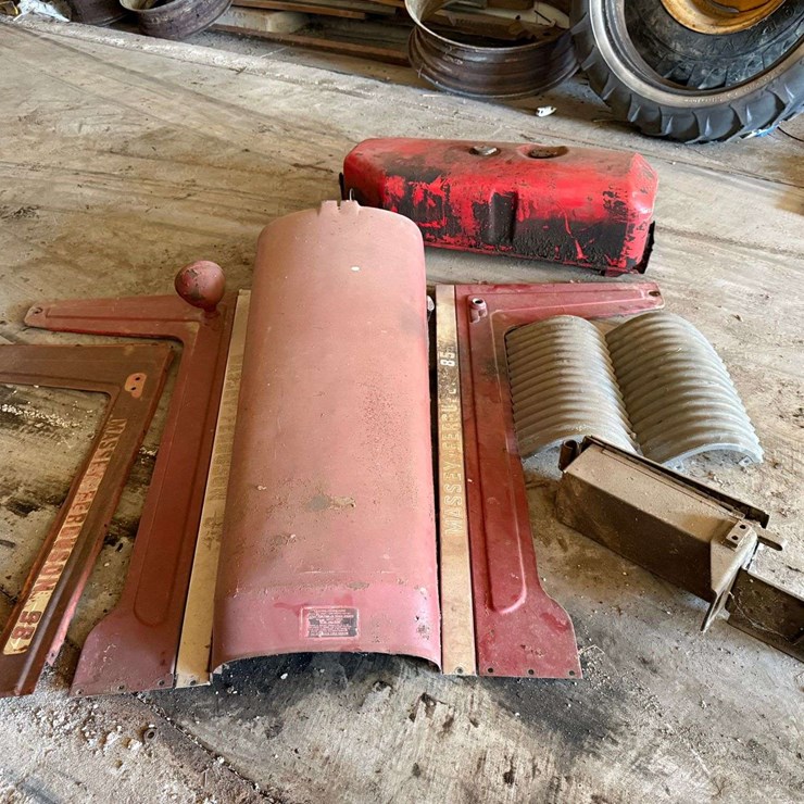 Assortment of Massey farm equipment parts