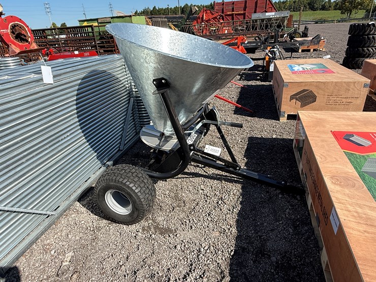 #69-•-pull-type-fertilizer-spreader-image-1