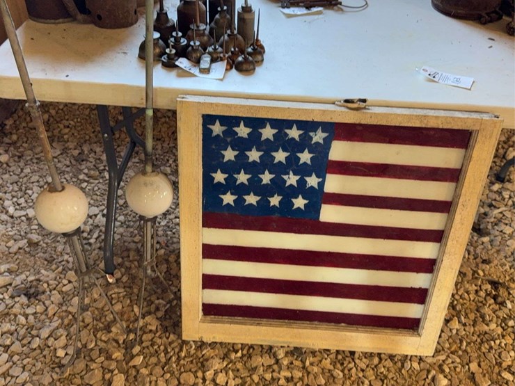 lighting-rods-and-american-flag-painted-on-old-window-image-1