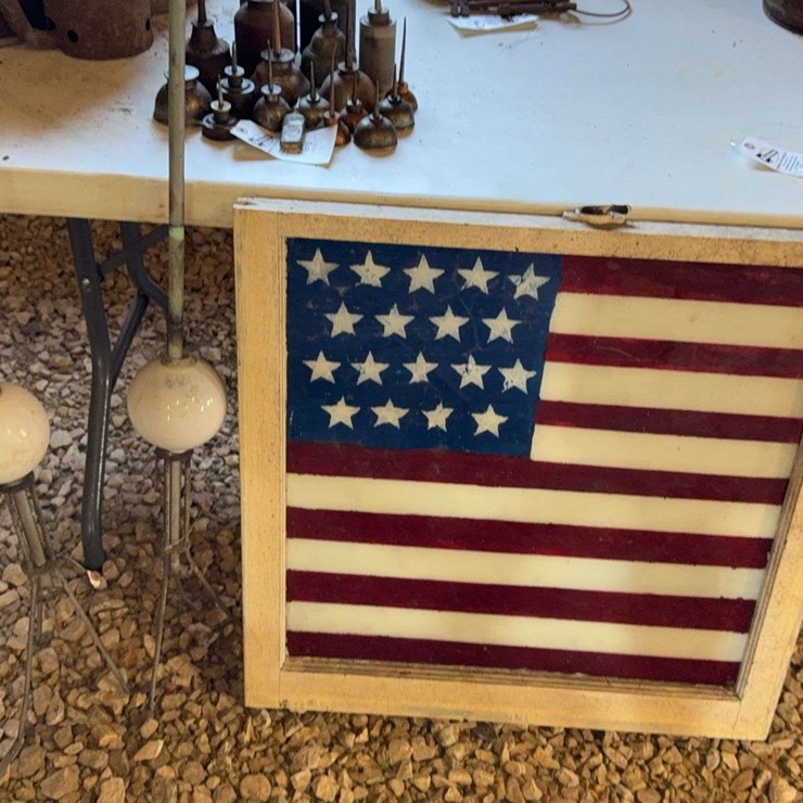 Lighting Rods and American Flag painted on old window