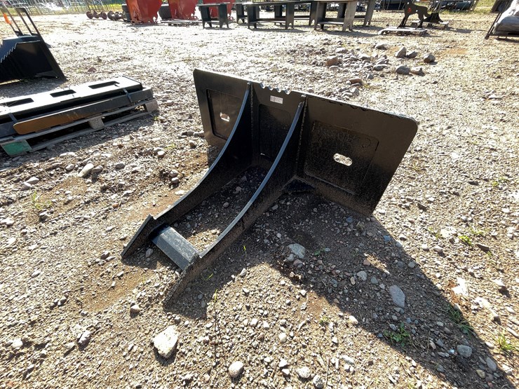 #8224-•-new-kc-skid-steer-rock-digger-image-1