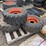 #6399-•-(3)-skidsteer-tires-and-rims-image-1