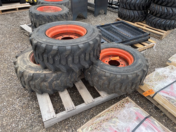 #6399-•-(3)-skidsteer-tires-and-rims-image-1