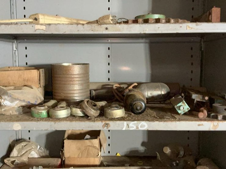 #150-•-parts-shelf-and-contents-image-12