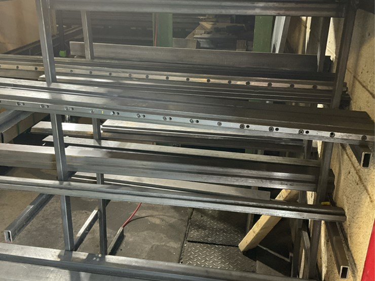 #104-•-metal-rack-with-press-dies-image-9
