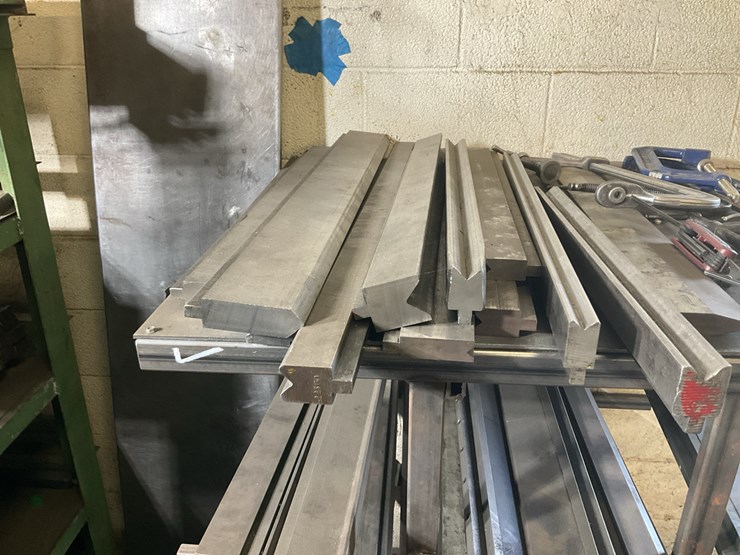 #104-•-metal-rack-with-press-dies-image-4