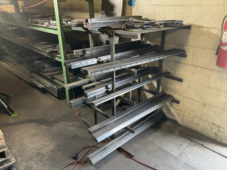 #104-•-metal-rack-with-press-dies-image-2