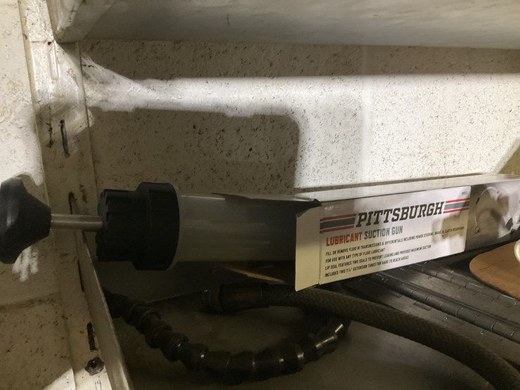 #161-•-steel-shelf-and-contents-image-3
