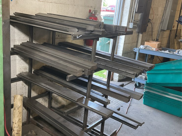 #104-•-metal-rack-with-press-dies-image-3