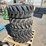 (4)-12-16.5-skid-steer-tires-image-1