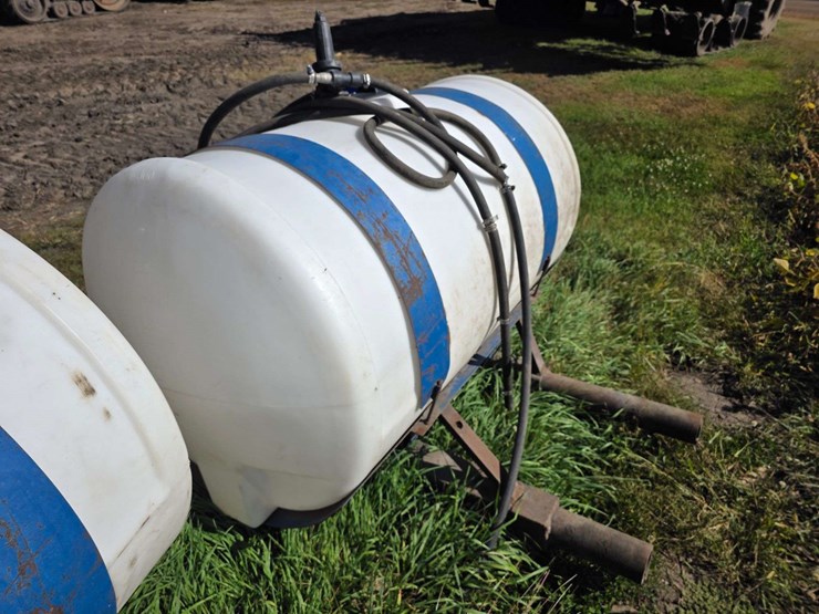 (2)-300-gallon-poly-tanks-on-saddles-with-brackets,-tanks-are-good-and-only-a-few-years-old,-mostly-image-8
