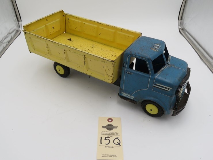 1930's-1940's-marx-pressed-steel-dump-truck-with-lithograph-image-2