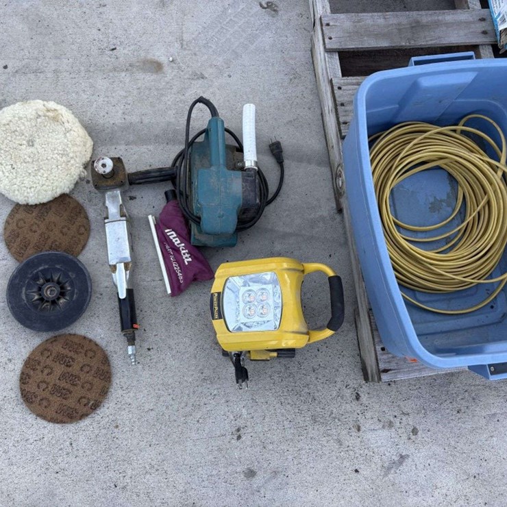 Contents of Tote: LED Shop Light; Makita Belt Sander, Air Angle Sander, with Pads; Romex Wire