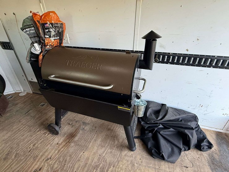 trager-pellet-grill,-always-covered-and-only-used-a-few-times,-comes-with-cover,-scraper,-chicken-ho-image-1