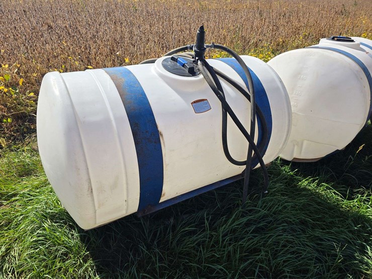 (2)-300-gallon-poly-tanks-on-saddles-with-brackets,-tanks-are-good-and-only-a-few-years-old,-mostly-image-2