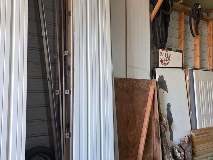 (1)-used-12’-x-11’2”-garage-door,-¾”-foam-insulation,-comes-with-all-track-(high-lift-track-up-to-14-image-1