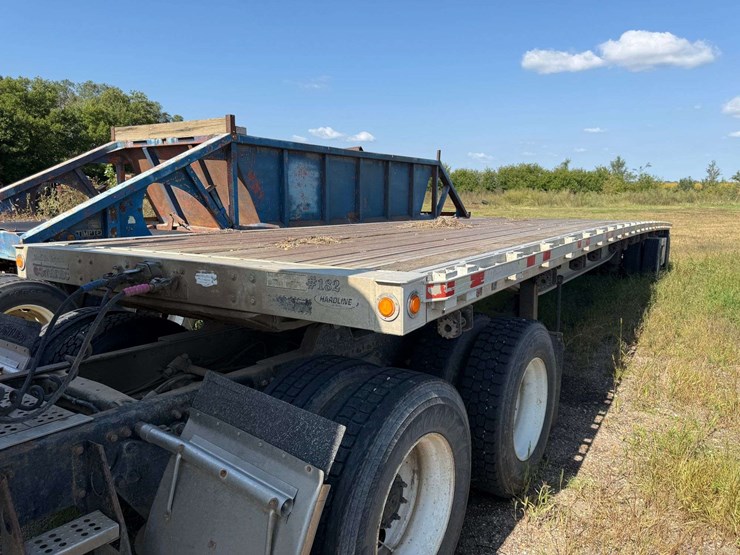 mannac-flatbed-smi-trailer,-approx-48’-long,-295/75r22.5-tires-image-1