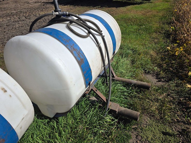 (2)-300-gallon-poly-tanks-on-saddles-with-brackets,-tanks-are-good-and-only-a-few-years-old,-mostly-image-6