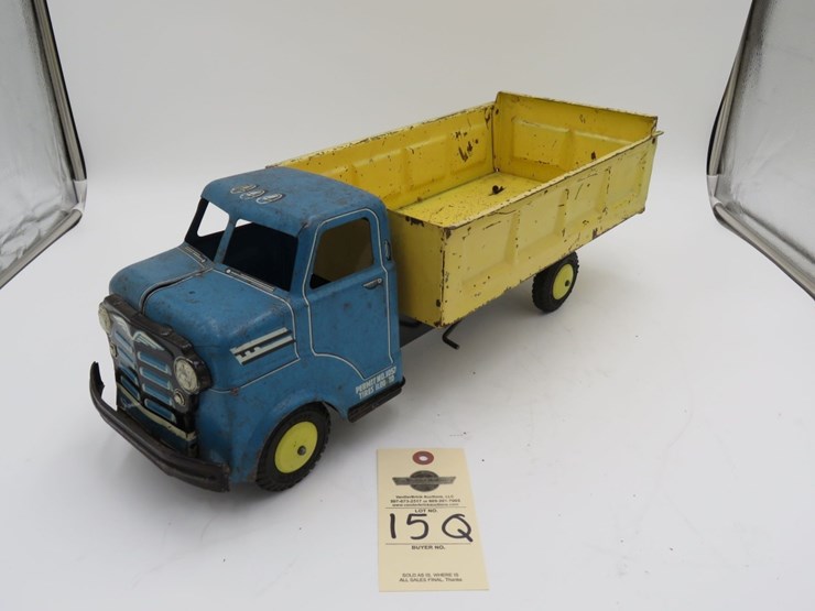 1930's-1940's-marx-pressed-steel-dump-truck-with-lithograph-image-1