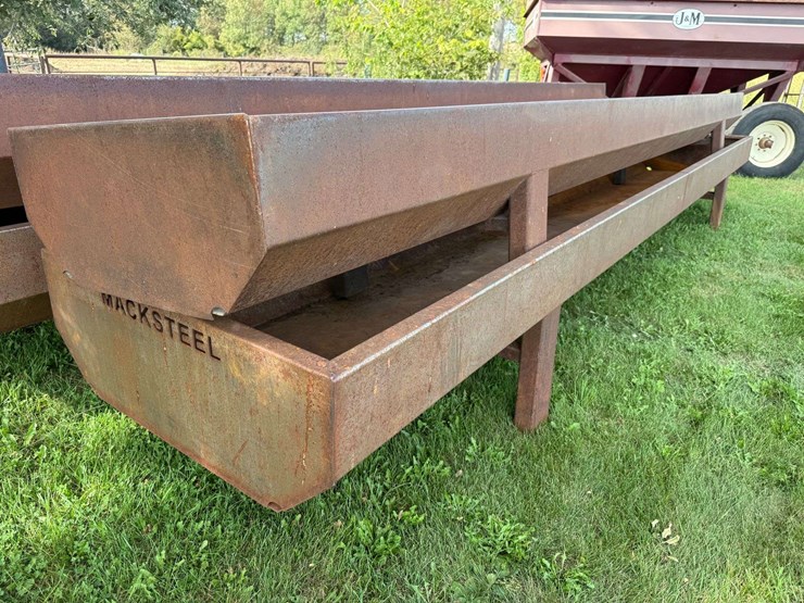 (2)-macksteel-feed-bunks,-(1)-22’-long,-43”-wide,-29”-tall,-15”-deep,-and-(1)-20’-long,-34”-wide,-28-image-1