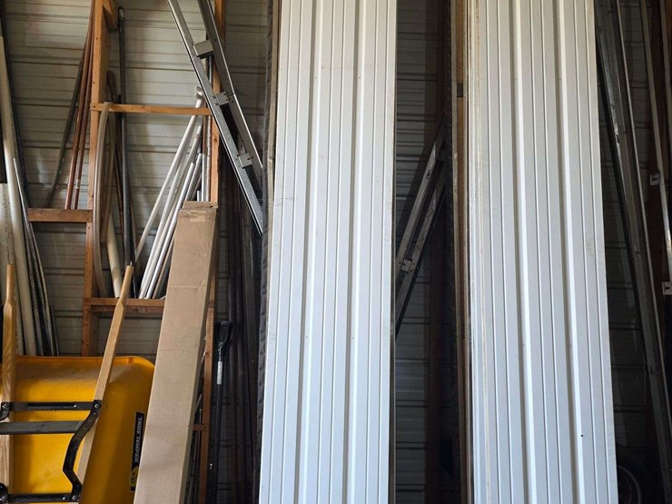 (1)-used-12’-x-9’-garage-door,-¾”-foam-insulation,-comes-with-all-track-(high-lift-track-up-to-14’),-image-1