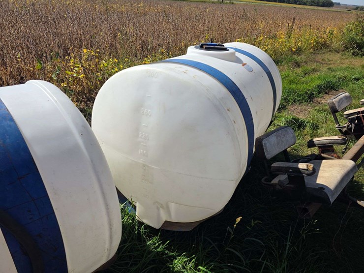 (2)-300-gallon-poly-tanks-on-saddles-with-brackets,-tanks-are-good-and-only-a-few-years-old,-mostly-image-3