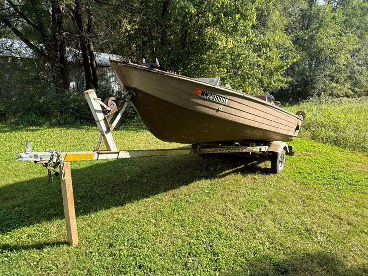 mirro-craft-boat,-motor-and-trailer,-65hp-evinrude-engine,-aluminum-boat,-has-been-stored-for-approx-image-1