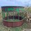 round-bale-feeder-with-hay-savor-and-skirt-on-bottom-image-2