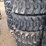 (4)-12-16.5-sks1-skid-loader-tires-image-1