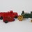 #38-•-#4201-•-(3)-antique-cast-iron-toys-featuring-fire-truck,-tractor-and-motorbike-image-1