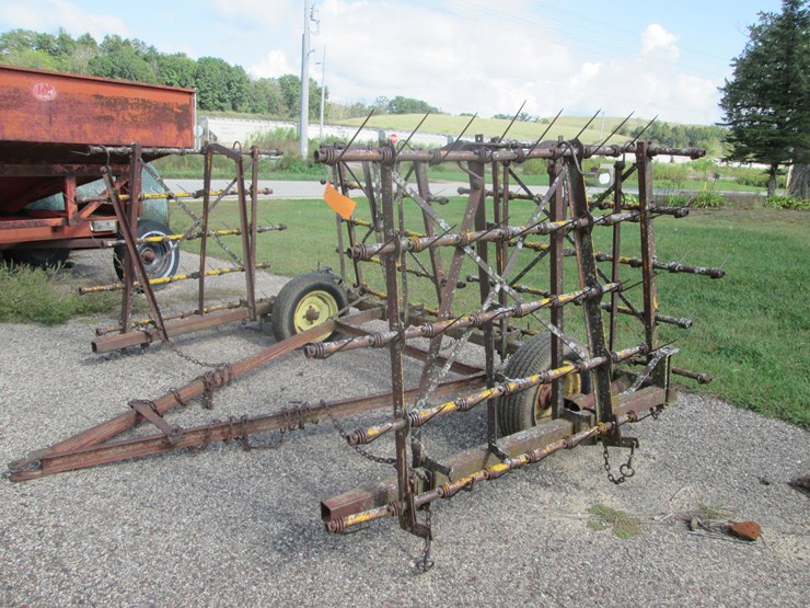 #5031-•-(4)-section-spring-tooth-drag-on-cart-image-1