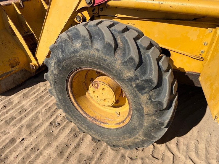 2000-deere-310se-image-9