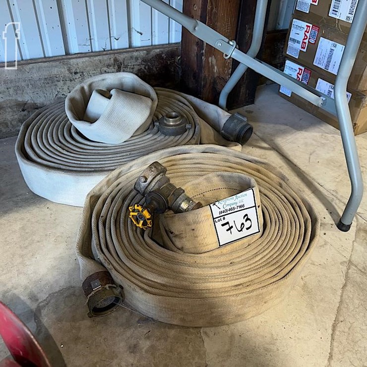 UNKNOWN (2) DISCHARGE HOSES