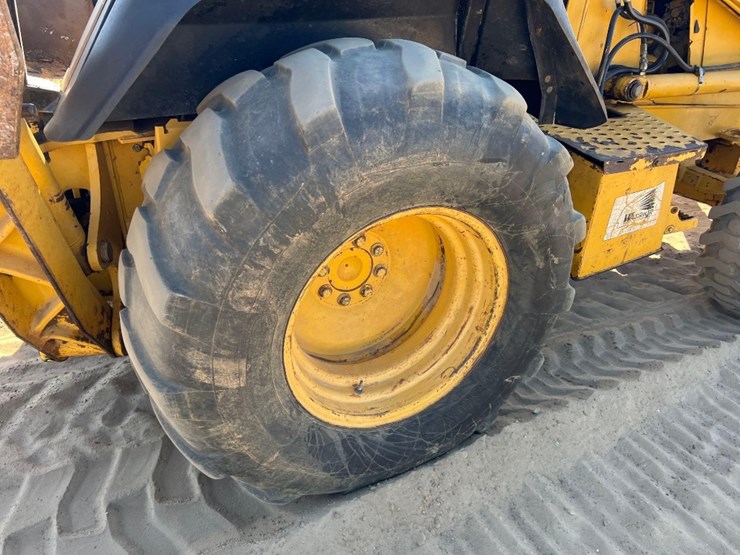 2000-deere-310se-image-11