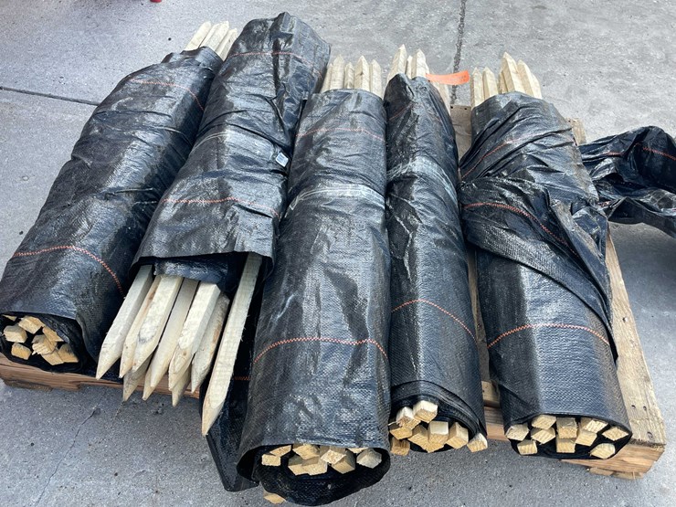 #1964-•-wood-stakes-and-tarp-fencing-image-5