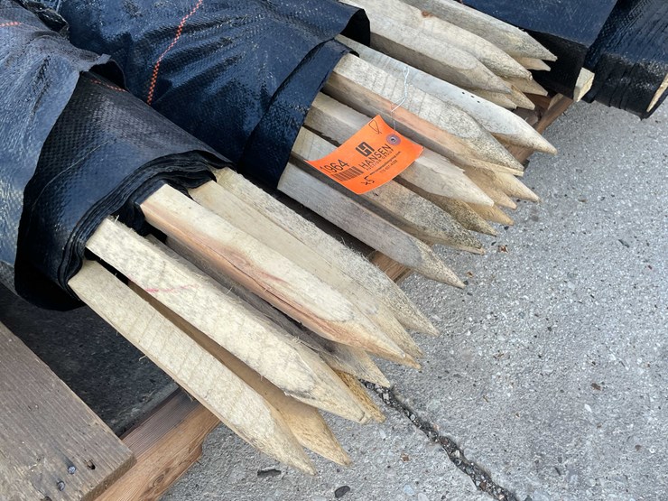 #1964-•-wood-stakes-and-tarp-fencing-image-4