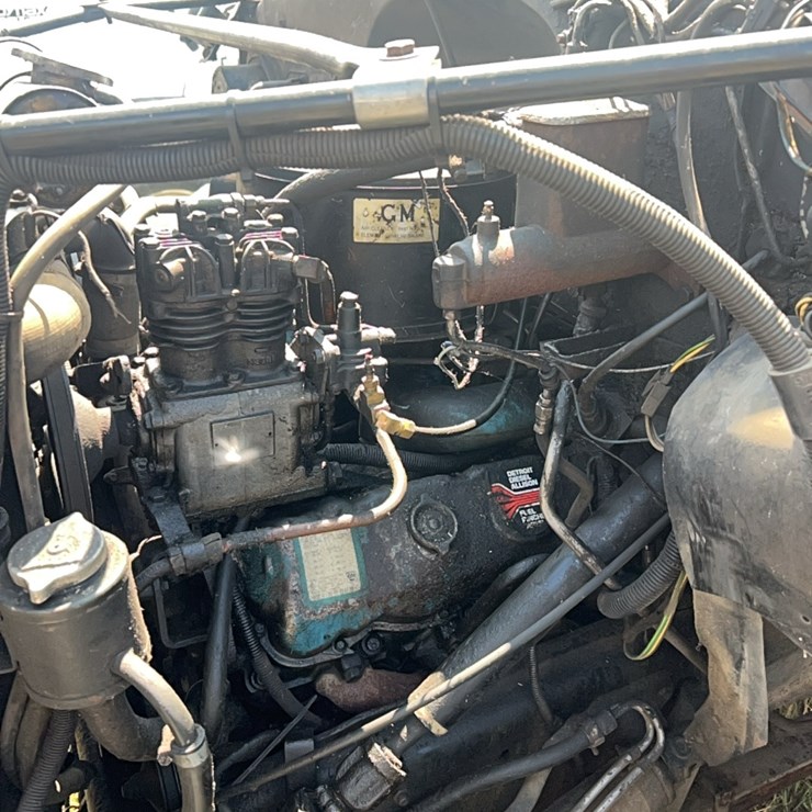 GMC tandem twin screw grain truck, live bottom box, fuel pincher Detroit diesel, tilt back hood, 5 speed with hi/lo