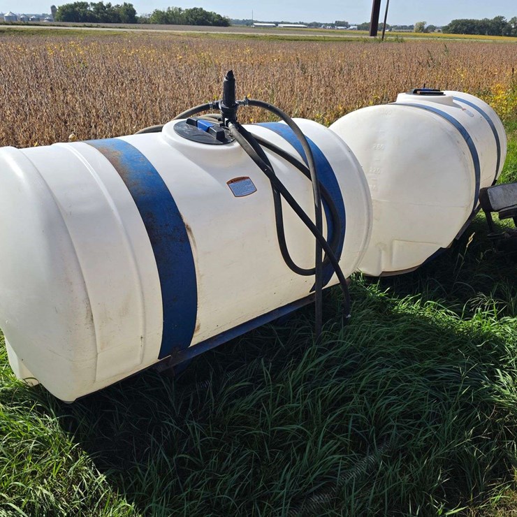 (2) 300 Gallon Poly Tanks on Saddles with Brackets, Tanks are Good and Only a Few Years Old, Mostly